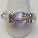 RKK016 - 8mm Round Tanzanite Ring